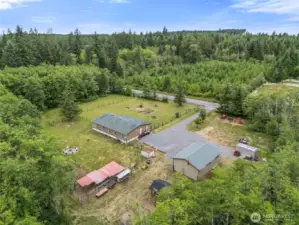 Home, shop & outbuildings on 3.69 acres.