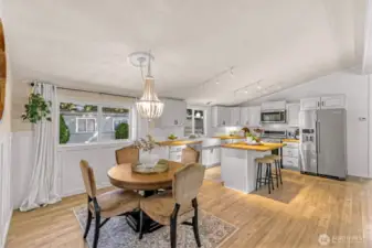 View of the kitchen and dining space from the primary bedroom