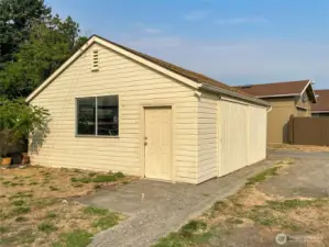 Detached 2-car garage - there may be potential to turn this into a DADU! Buyer to verify.