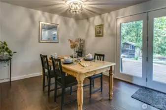 Dining room w/ glass doors to the deck