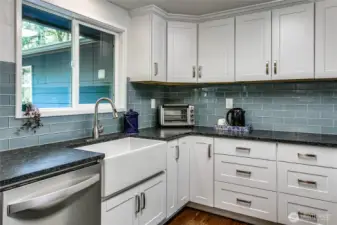 Leathered granite counters and farm sink!