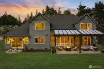 Virtually staged image showing how the patio could be enhanced with a covered pergola.