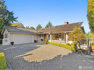 Welcome to Horizon View where this meticulously laid paver driveway greets you and allows for an abundance of parking for all of your guests.