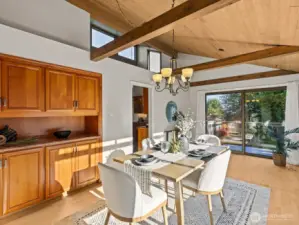 A formal dining space immediately to your right is illuminated by clerestory windows. A built-in buffet provides great storage for your celebratory dinnerware.