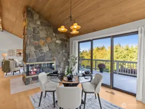 Accented by a stone fireplace, you're sure to keep nice and cozy during the cooler months. Electric exterior shades on the sliding doors are an added luxury.