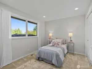The 1st of 2 bedrooms on the main floor.