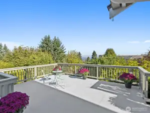 The tremendous deck has so much flexibility. You'll never miss a sunset from here.