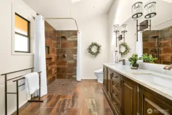 The primary ensuite bath  with a step-in shower