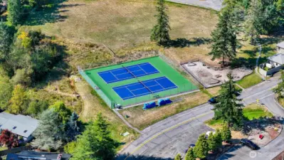 Pickleball, tennis and a playground are part of the Shelter Bay amenities