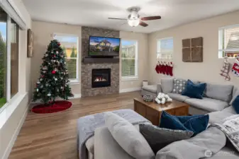 Extral large family room with a gas fireplace for comfy winter days.