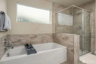 Large soaking tub for those bubble bath days. Walk in shower.