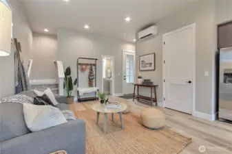 Great room with TV wall mount and mini splits for year-round comfort.