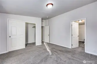 Deep closet in the primary bedroom.