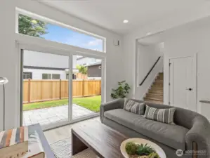 Soaring ceilings on this flex space on the main level, which doubles as a 4th bedroom! Model home.