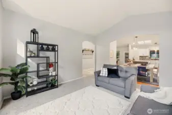 Formal living area joins effortlessly to the dining space