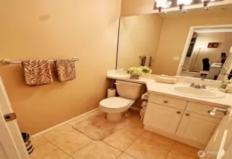 This beautiful home with 1.5 baths! This Powder room surround with tile floor & tile countertop!