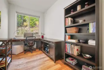 Flexible use room on the main floor overlooking the garden, ideal for office or studio.