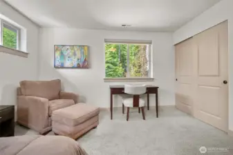Addition view of bedroom overlooking tranquil garden.