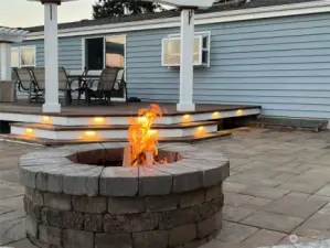 Pleasant evenings can be spent around the firepit and large patio