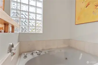 Soaking tub in upper bathroom