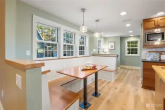 Ample seating options at this convenient breakfast nook located in the kitchen.