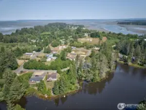 View from across the lake depicting lot and private cove