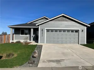 Drive way and 2 car garage.