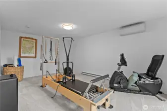 Gym or Den space w/attached half bath