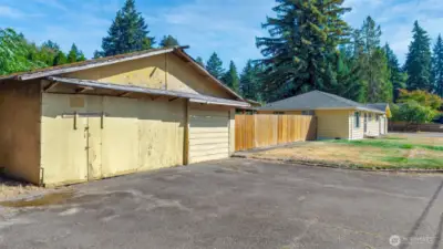 Detached additional garage marks a great workshop with a bit of TLC.
