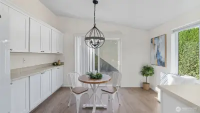Eat-in kitchen with designer lighting and work space