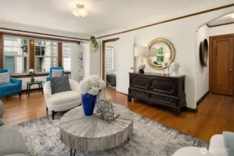 The living room is exceptionally large and can accommodate a second seating area, work from home space, or other creative use.