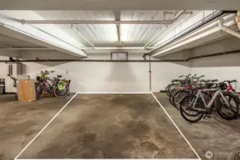 Unit #302 has one of just eight secure garage parking spaces - a rare and valuable find in Lower Queen Anne!
