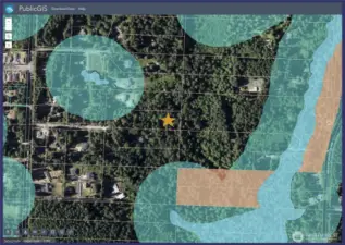 Completely surrounded by woodlands.  No wetlands!