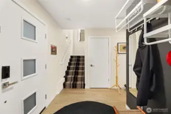 Entrance hall area. Coat closet and room for extra storage system.