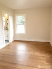 Main level room can be used as an office or additional bedroom.