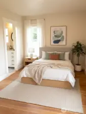 Virtually staged as a Main Level bedroom -light and airy for a peaceful rest