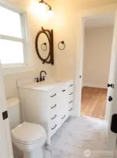 Convenient quarter bathroom on main level