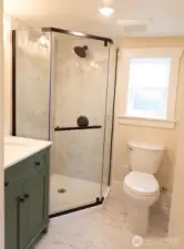 The shower has beautiful finishes