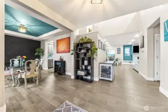 As you walk in, the formal dining room to the left with butler's pantry in the distance