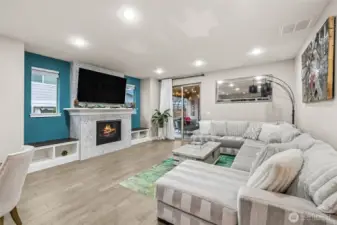 Gorgeous gas fireplace with mosaic tiles and built ins.