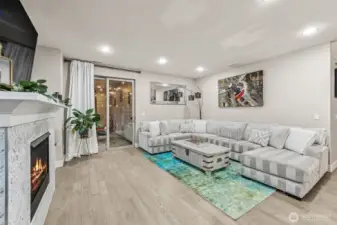 Another view of the great room with slider out to covered patio