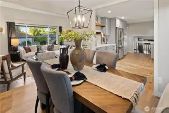 View of dining room, looking out to kitchen and living room.
