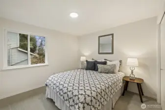 2nd bedroom upstairs easily accommodates a queen size bed.