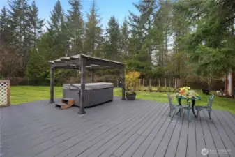 Hot tub under the pergula-perfect for relaxing year round.