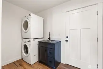 Laundry with sink, door to garage