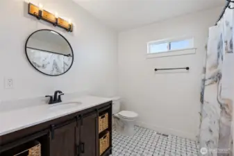 Full bath between bedrooms 2 and 3