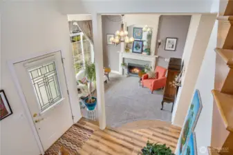 View from upstairs coming down to the front door