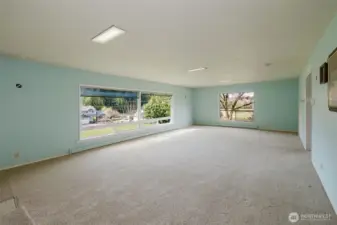 Picture windows in living room, overlooking pastoral setting!