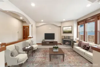 This stylish Family Room is spacious and very open. (Virtually staged).