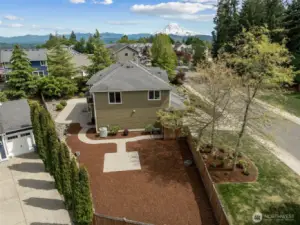 Large side yard provides so much room to play, garden, or relax.